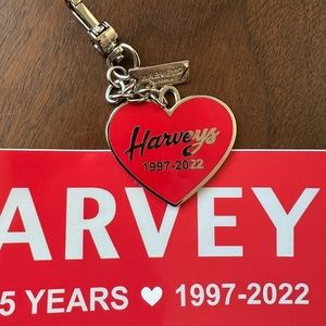 Harveys 25th anniversary charm and sticker. New never used